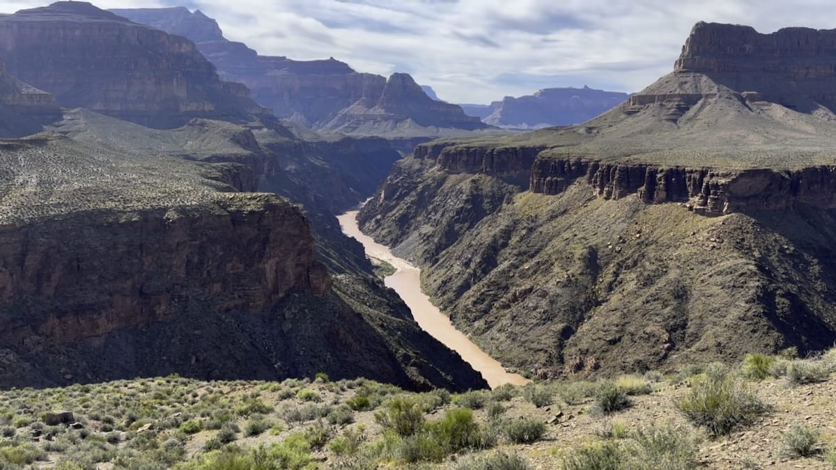 grand-canyon-hermit-rapids-colorado-river Panoramic view of the Colorado River at Hermit Rapids in the Grand Canyon.