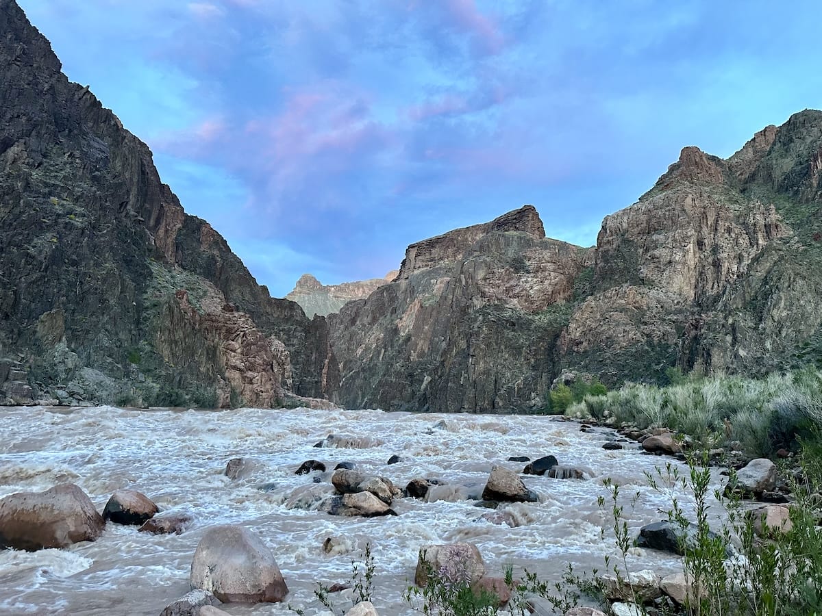 granite-rapids-campsite-colorado-river-grand-canyon Colorado River at Granite Rapids campsite in Grand Canyon National Park, with rushing water and canyon views.