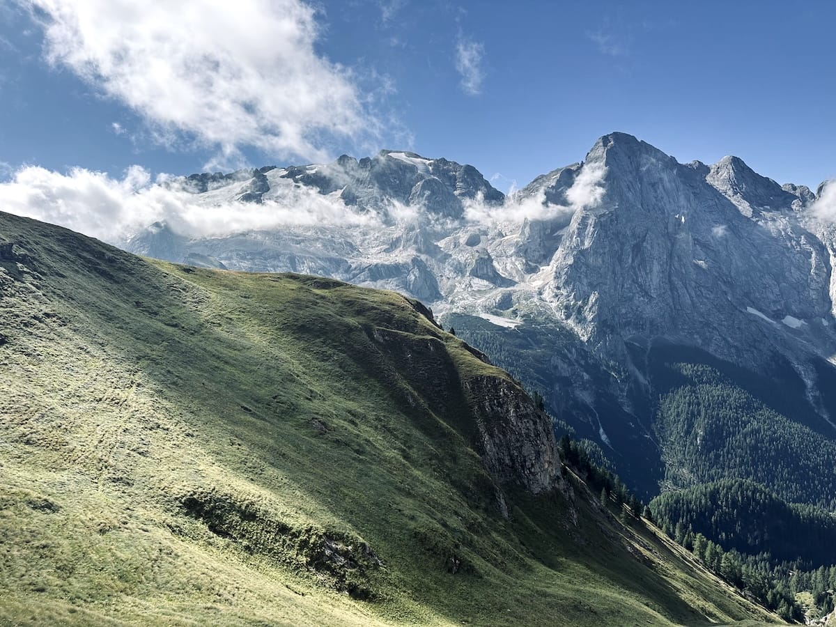 Mountain landscape with snow-capped peaks and clouds in the Dolomites along the Alta Via 2.
