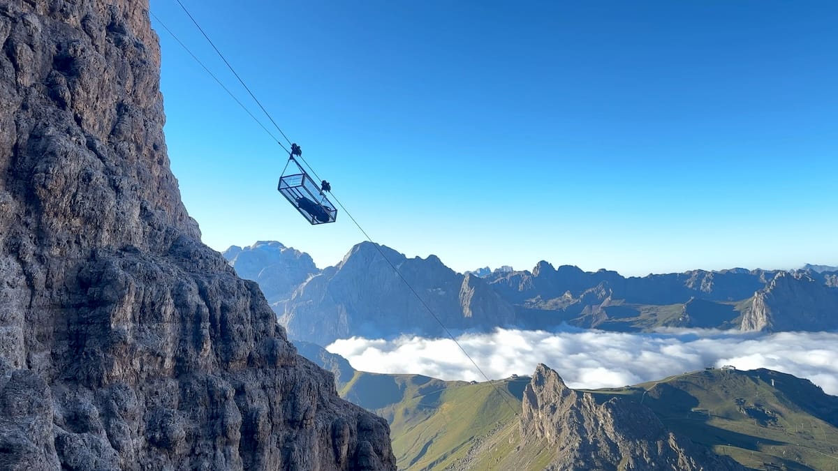 Cable car carrying supplies to Rifugio Forcella Pordoi on the Alta Via 2.