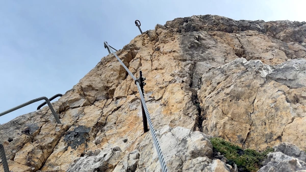 Via ferrata climb towards Passo delle Farangole in the Dolomites.