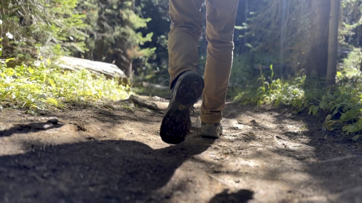 la-sportiva-wildcat-trail-hike-dirt Rear close up view of hikers shoes on a dirt trail.