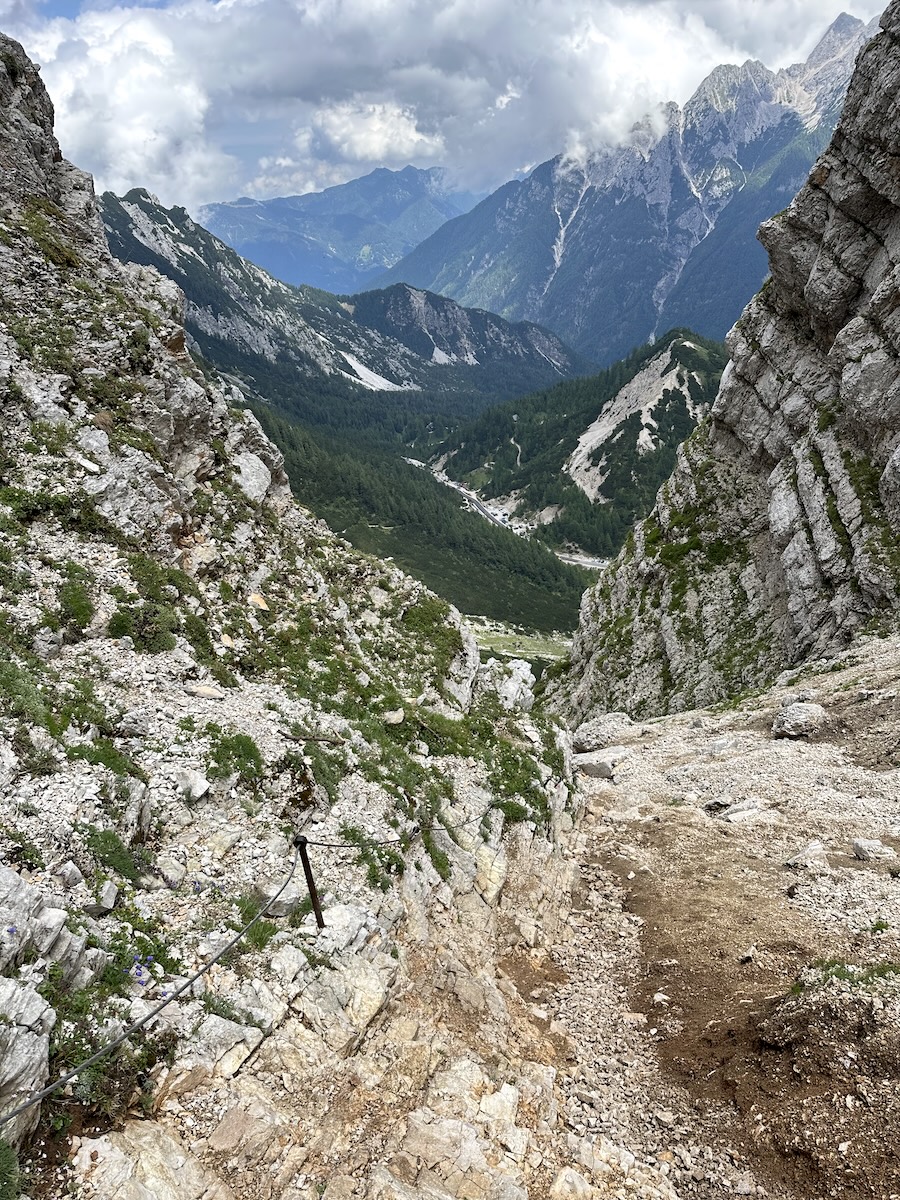 Via ferrata cable section on the Vršič Pass hike with mountain views