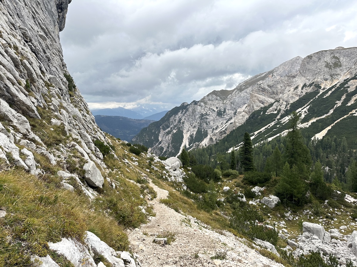 Rocky trail along Dolomite cliffs, Alta Via 1 Italy