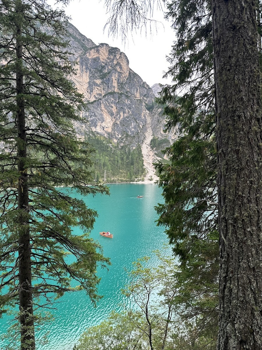 Lago di Braies with turquoise water and rowboats, Alta Via 1 Dolomites