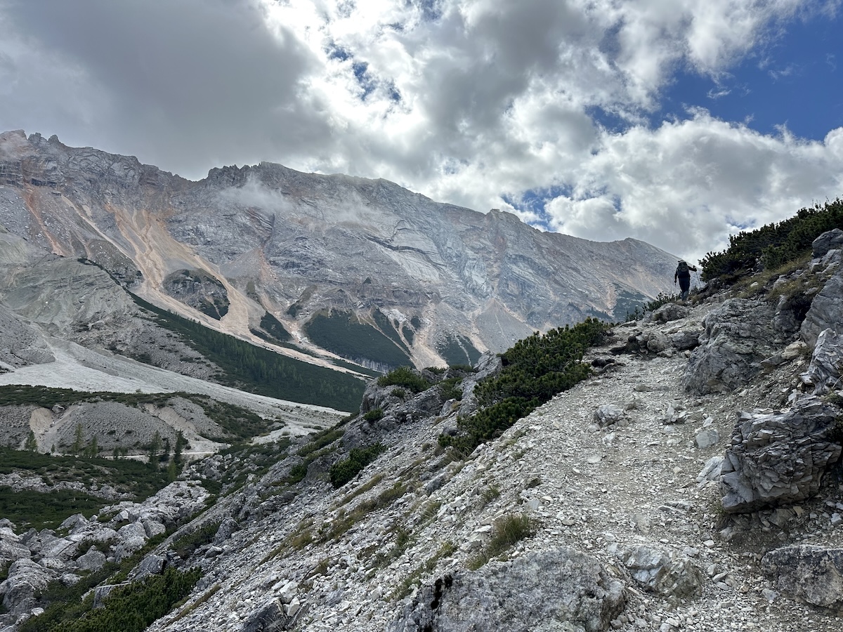 Hiker on rocky Dolomite trail, Alta Via 1
