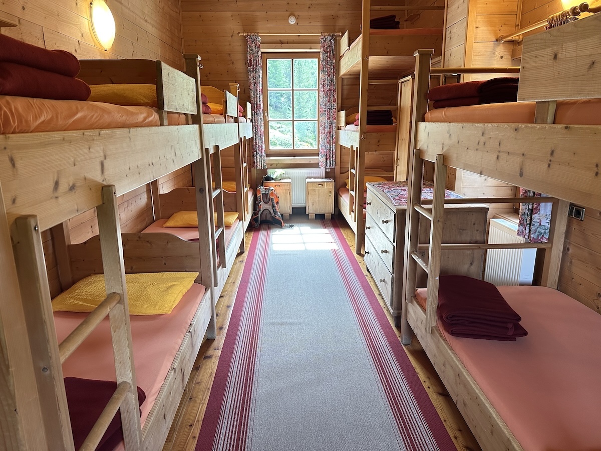 Bunk beds inside rifugio dormitory Dolomites