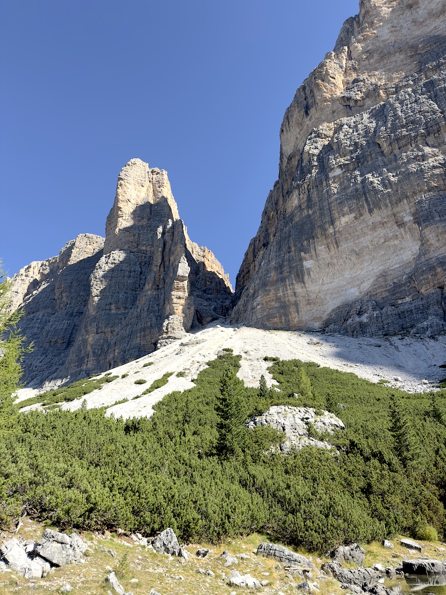 Towering Dolomite rock spires against blue sky