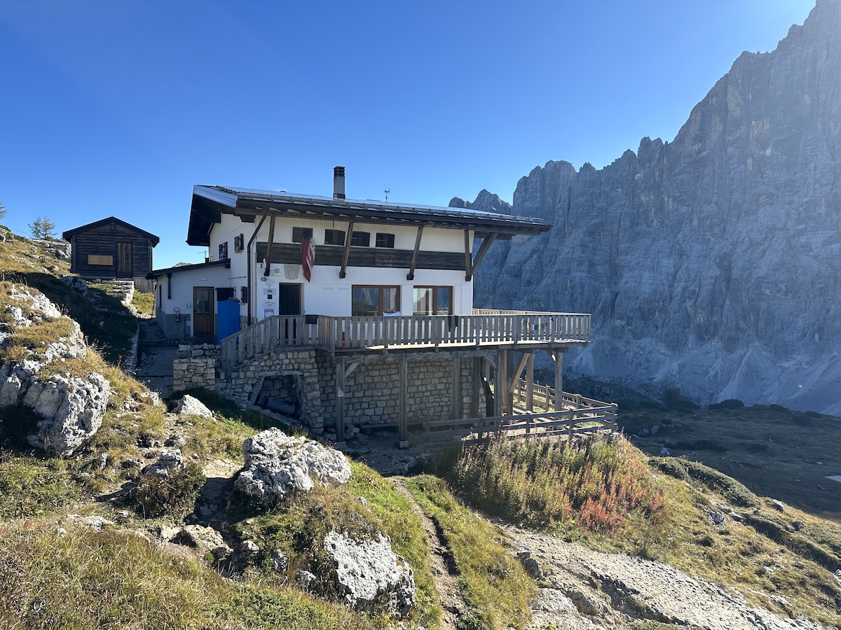 Rifugio Tissi perched on rocky slope