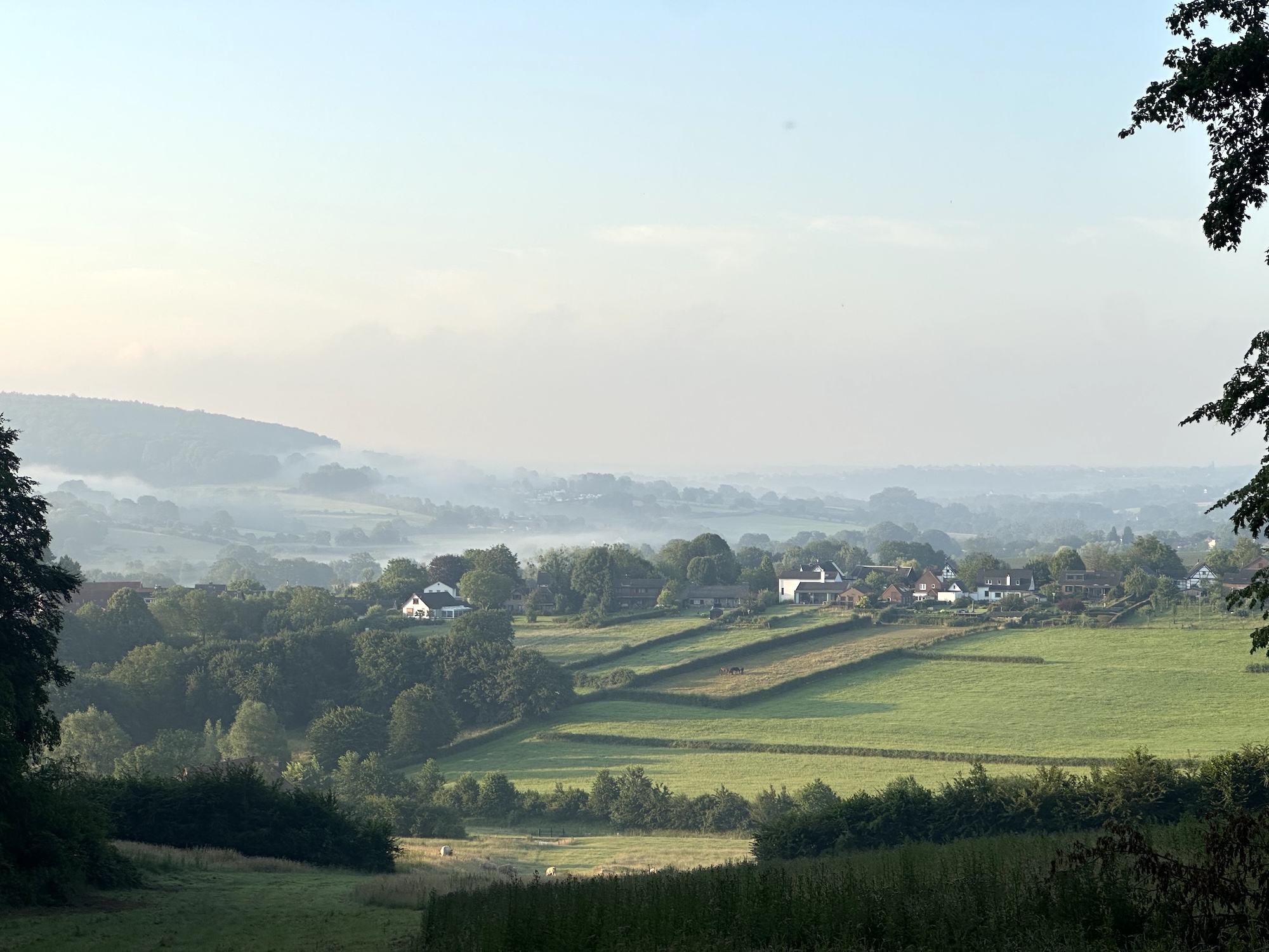 View across the hills and villages of South Limburg from the Dutch Mountain Trail near Gulpen, Netherlands.