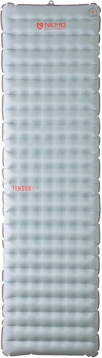 NEMO Tensor All-Season inflatable sleeping pad shown fully inflated, light grey with quilted baffles