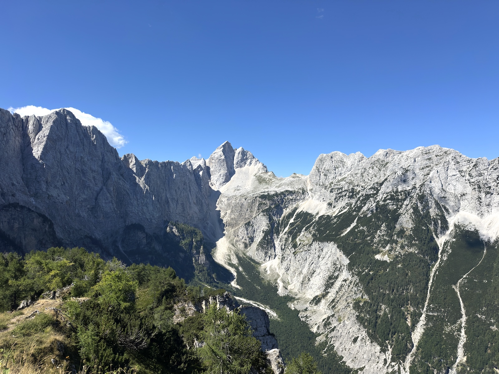 slemenova-spica-summit-panorama-julian-alps-1600 Panoramic view across the Julian Alps from the summit on the Slemenova Špica hike, Vršič Pass, Slovenia.