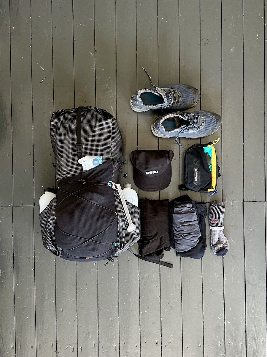 Atom 40L fully packed for hiking the Albanian Alps, with a Katadyn BeFree and water bottles in the side pockets